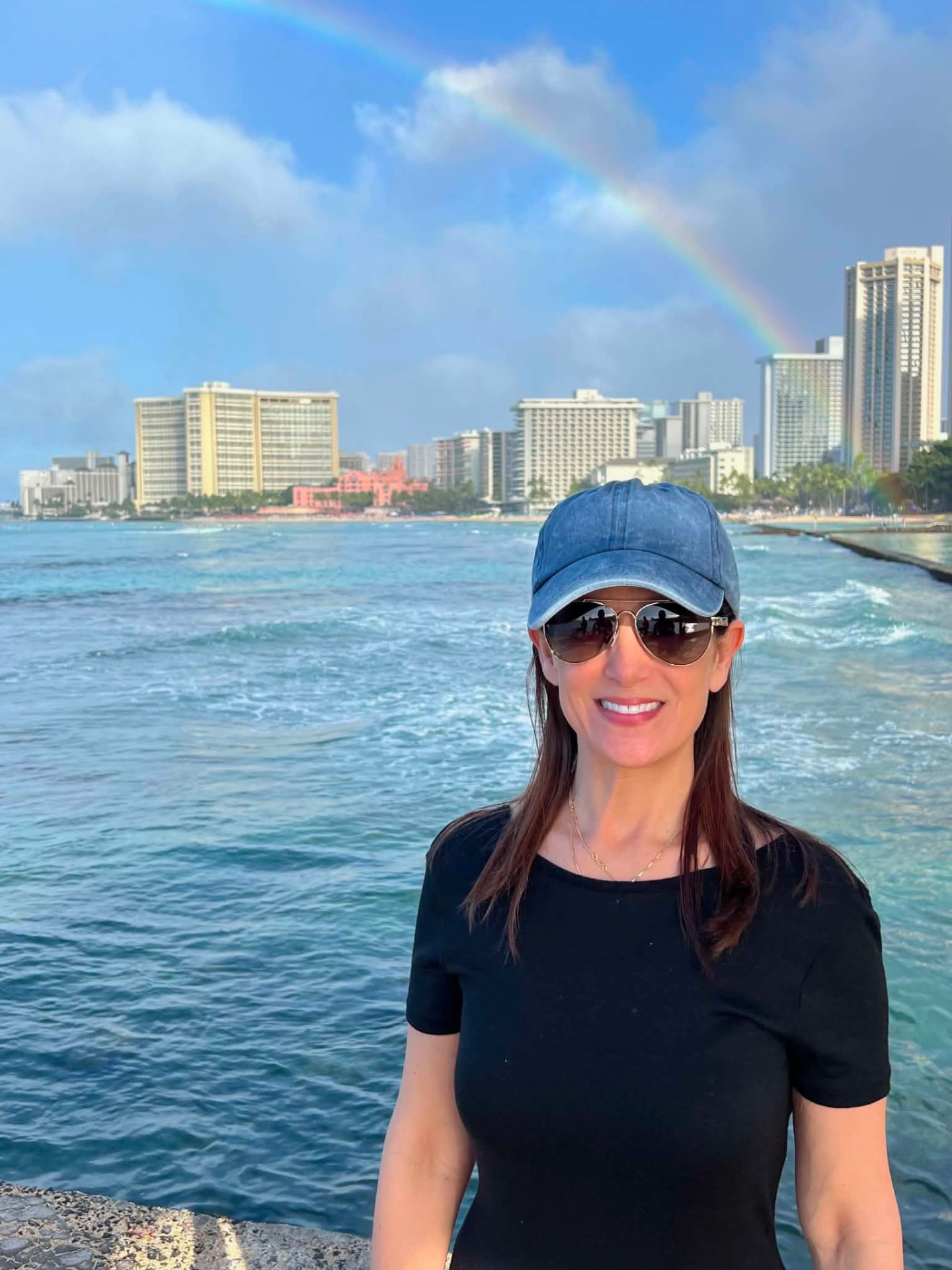 Christine Scott outdoors by the ocean